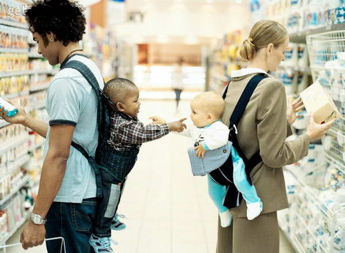 babies on backs in store