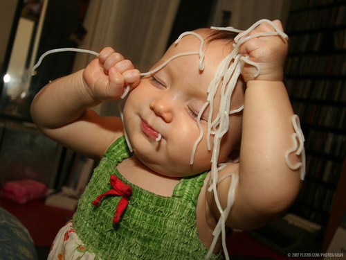baby with spaghetti